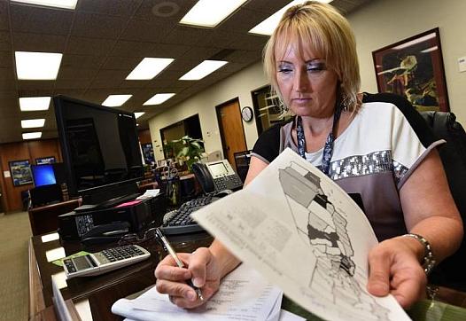 Kayla Wilson, who teaches sex education courses throughout Fresno County, at work in her office at the Fresno County Office.