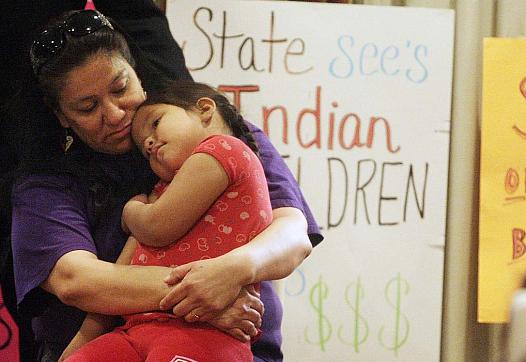 Madonna Pappan and her child in 2013. Pappan was is one of three Sioux mothers who sued South Dakota over its alleged violation
