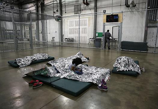 U.S. Border Patrol houses unaccompanied minors in detention centers like this. || Photo Credit: John Moore/Getty Images News/Get