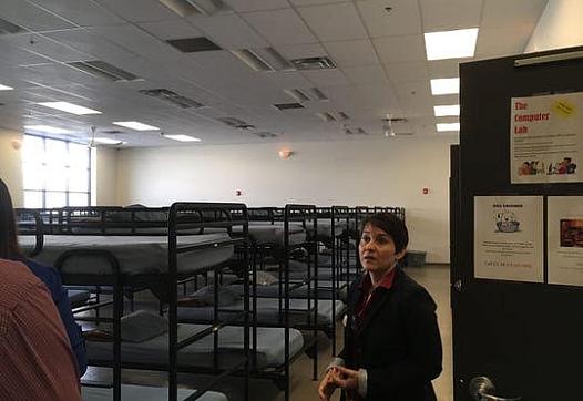 Amina Aun, shelter manager at Roy's Desert Resource Center, offers a tour of the shelter.