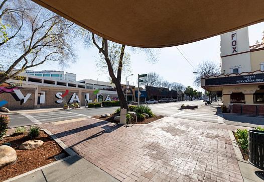 Empty crosswalks and sidewalks are the new norm in Downtown Visalia on Monday, March 30, 2020.
