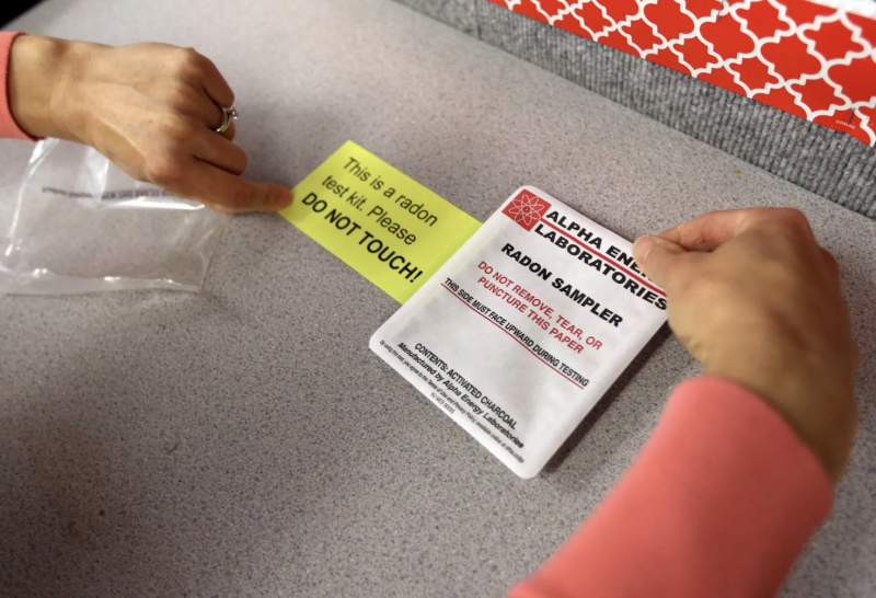 Deseret News special projects reporter Sara Israelsen-Hartley puts a radon test kit in a classroom in Salina Elementary School in Salina on Tuesday, Oct. 8, 2019. Kristin Murphy, Deseret News