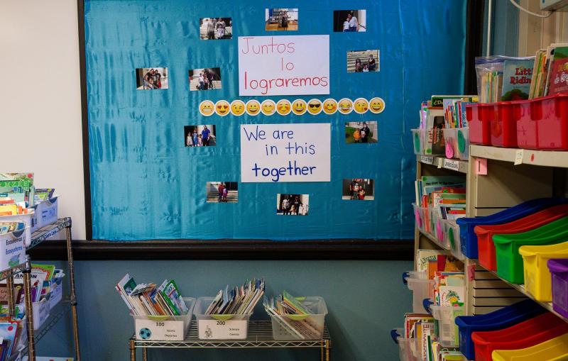To help create a sense of community, Contreras assembled a collage of photos of her students and their parents. After she set up her classroom, she gave students a virtual tour. Michelle Kanaar / WBEZ