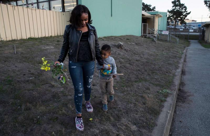 Jasmine Murray-Thomas and her 3-year-old son, Jeremiah Micai Thomas, outside Jeremiah’s school in Daly City. As a teenager, Murray-Thomas was sent to two residential treatment programs outside of California operated by Sequel Youth & Family Services. Carlos Avila Gonzalez, The Chronicle