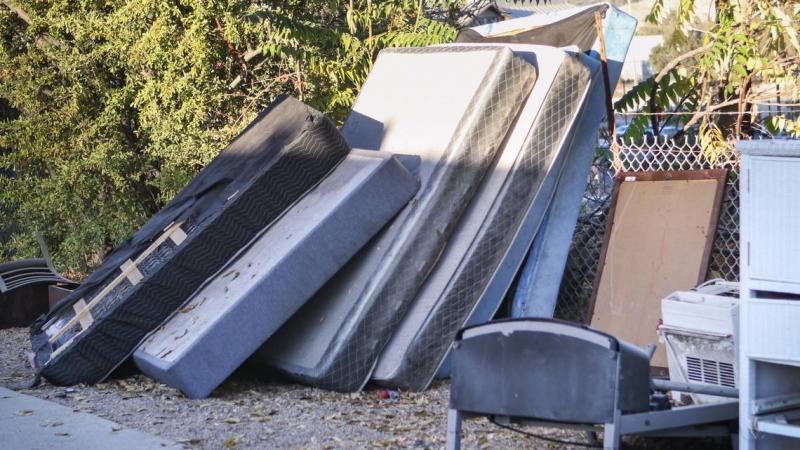 Renters discarded mattresses and furniture behind the Grand View Apartments complex in Paso Robles because they were infested with bedbugs and cockroaches. David Middlecamp DMIDDLECAMP@THETRIBUNENEWS.COM