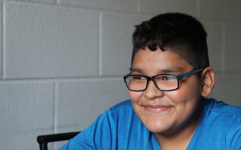 Brandon Garcia, 13, found virtual school to be tough. His grades slipped and some days he climbed an apple tree to connect to school because the internet connection was better. ANDREA MELENDEZ/THE USA TODAY NETWORK-FLORIDA