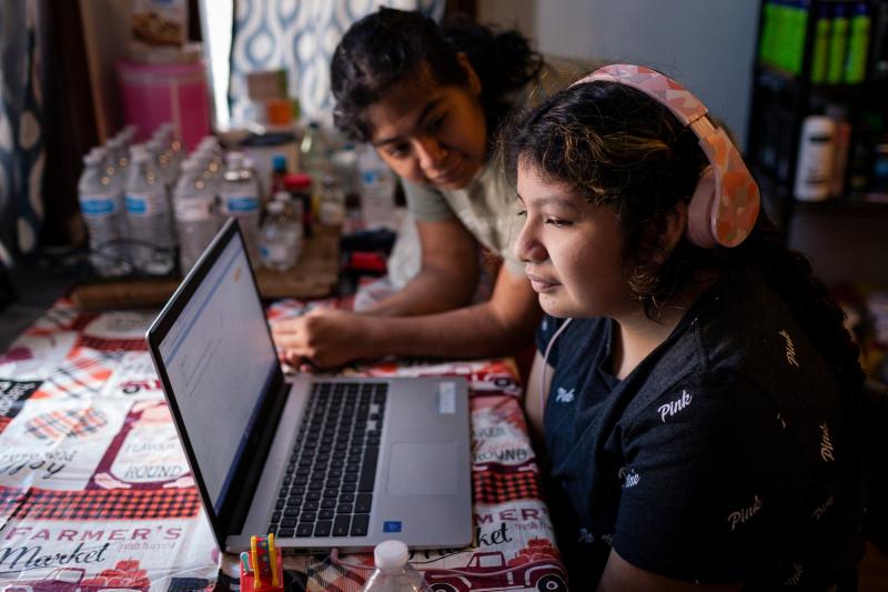 Sarai Camarillo says the pandemic has been especially hard on her sister, Isamari Lucero, 13, who has been dealing with the challenges of remote learning and the death of her father, Margarito Lucero. Michelle Kanaar / WBEZ