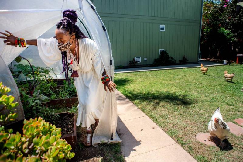 Midwife Racha Tahani Lawler started growing vegetables and raising chickens, so she could fill her clients’ bags with fresh produce and eggs during their visits in her backyard.(Photo by Sarah Reingewirtz, Los Angeles Daily News/SCNG)