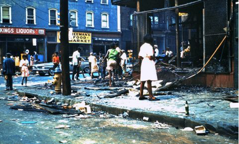 Looted stores along Broome Street during the 1967 Newark riots. Al Lowe