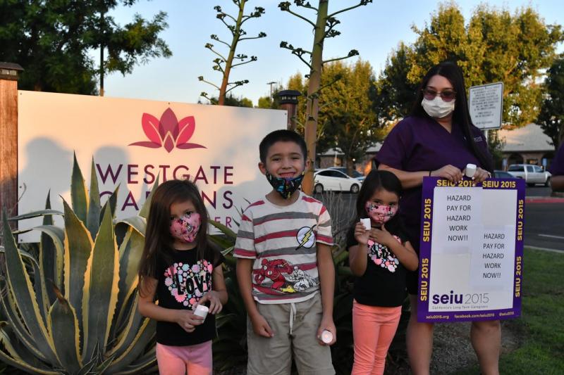 Westgate Gardens Care Center staff held a vigil at the nursing home, calling for boosted pay and better treatment during the coronavirus pandemic. Joshua Yeager