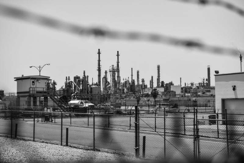 The Phillips 66 refinery looms from the distance in Wilmington, California. Pablo Unzueta