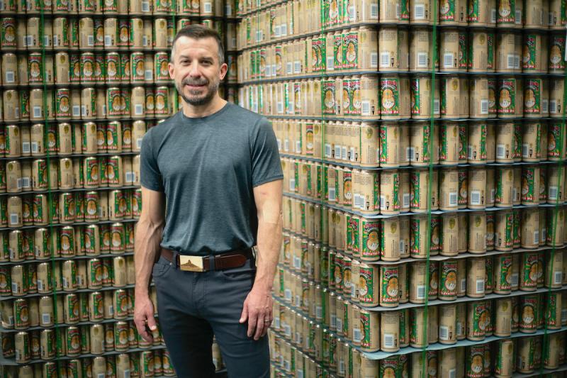 Jeff Erway stands next to distribution ready flats of his signature beer, Elevated. La Cumbre Brewing is one of New Mexico’s largest craft beer companies. CREDIT: Marjorie Childress for New Mexico In Depth