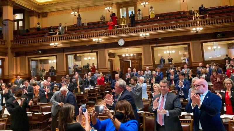 AP / Georgia House members applaud after they voted 166-0 for final passage of a sweeping mental health bill on Wednesday, March 30, 2022 at the state capitol in Atlanta. House Speaker Savid Ralston, R-Blue Ridge, spearheaded House Bill 1013 after years of study (AP Photo/Jeff Amy)