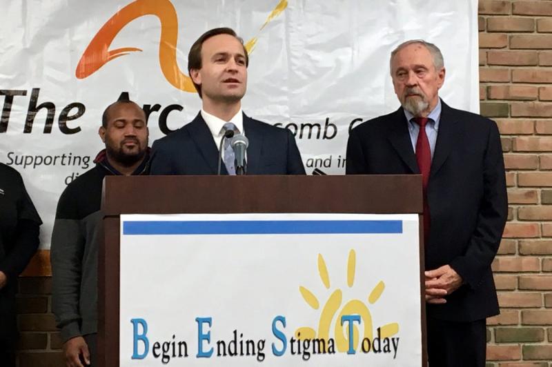 Michigan Lt. Gov. Brian Calley speaks about the rights of people with mental disabilities Tuesday, Dec. 20, 2016 at the Macomb Oakland Regional Center. Next to him are David Taylor, left, a community advocate, and The Arc Michigan Director of Public Policy Dohn Hoyle.  ROBERT ALLEN, DETROIT FREE PRESS