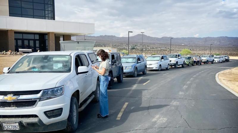 A line of more than 30 cars await a food distribution event to begin at Copper Mountain College in Joshua Tree on Aug. 2, 2022. For many in line, record high inflation and limited access to fresh produce has forced them to seek help. (Photo by Javier Rojas/Inland Valley Daily Bulletin/ SCNG)