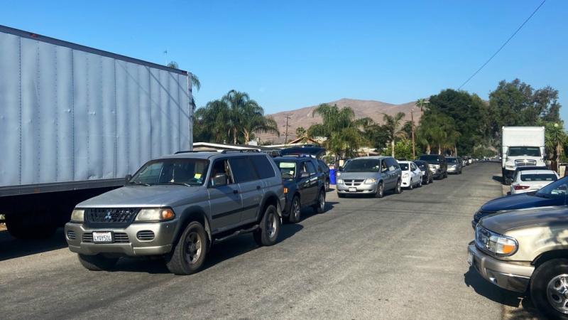 More than 50 cars line up for a food distribution event at Vida Life Ministries in Bloomington, California on July 16, 2022. Many wait more than two hours in their vehicles to receive aid. (Photo by Javier Rojas/Inland Valley Daily Bulletin/ SCNG)