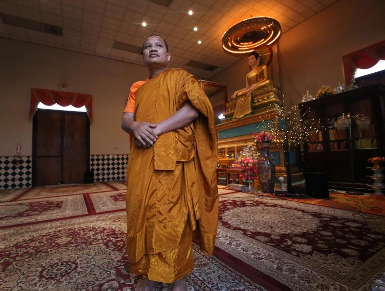 The Fresno Cambodian Buddhist Temple Abbot, Say Bunthon stands inside the temple on Friday, June 3, 2022 in Fresno, Calif. Gary Kazanjian