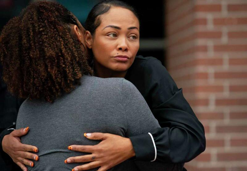 Dallas Garcia embraces a friend following a November press conference outside of the Harris County Jail. Garcia's son, Fred Harris, had been arrested the month prior for walking down Westheimer Road in Montrose with a knife. While in jail, he was killed in jail by another inmate.  Mark Mulligan, Houston Chronicle / Staff photographer