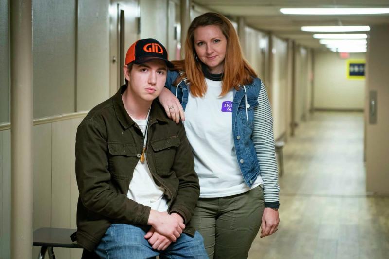 Brogan Sorensen, a 16-year-old student at Linda Tutt, poses with his mother, Jennifer, after a night volunteering at the grocery store in March.  Mark Mulligan, Houston Chronicle / Staff photographer