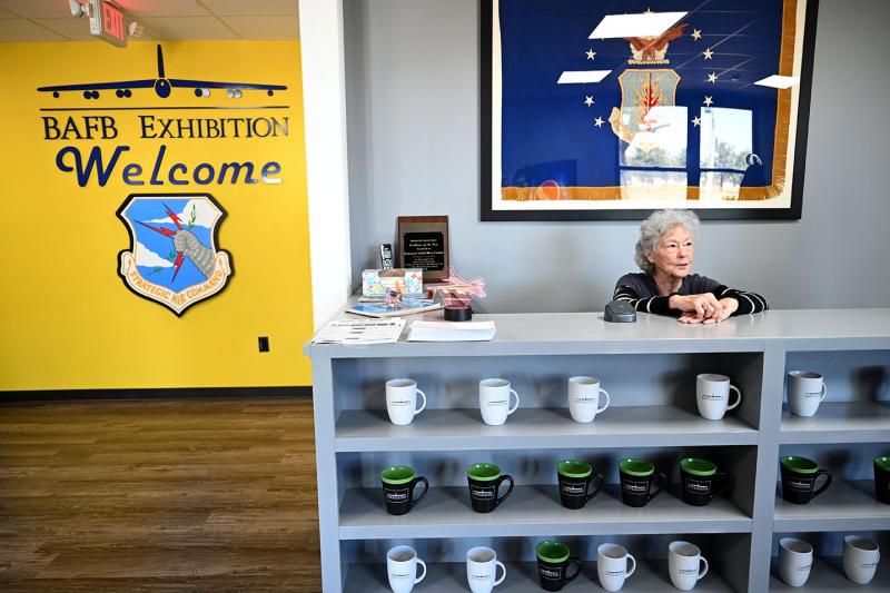  Mary Gay Shipley sits in the gift shop at the new Blytheville Air Force Base Exhibit on Friday, Nov. 5, 2021. The exhibit shows what the base was like in the height of the Cold War. (Arkansas Democrat-Gazette/Stephen Swofford)