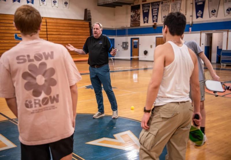 Todd Papianou coaches the tennis team Thursday at Mountain Valley High School in Rumford. He says he knows firsthand how dangerous and addictive opioid pain medicine can be. Andree Kehn/Sun Journal
