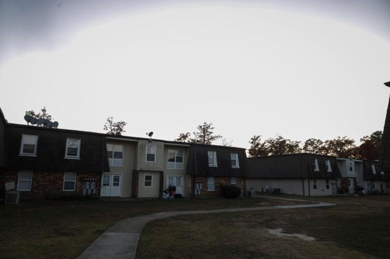 The sun sets behind Southwood, a 1,287-unit complex in South Richmond. Eight in 10 residents are Hispanic, with more than a quarter living in poverty. That's likely an undercount.  SHABAN ATHUMAN/TIMES-DISPATCH