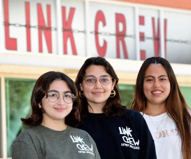 Patriot High School’s seniors Alisson Valle, left, and Kailyn Guerrero, center, are both members of the school’s Link Crew while Youth Court member and, former Link Crew member, Arely Jimenez, right, stands along side at the Jurupa Valley school on Wednesday, March 16, 2022. The crew is one of the ways that Jurupa Valley says they’ve been able to lower bullying levels in their district. (Photo by Will Lester, Inland Valley Daily Bulletin/SCNG)