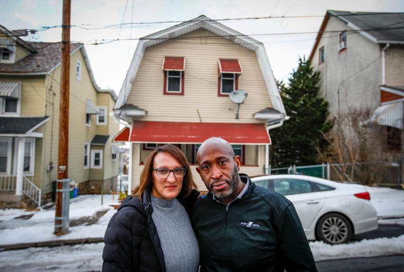 Murdocc and Karen Saunders stand outside their former Hillside Avenue home, which they regret selling. Living amongst student housing rentals became untenable for the family in late 2020. Saed Hindash | For lehighvalleylive.com