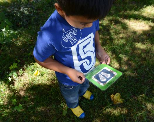 Matteo Castillo holds a copy of his baby footprints on Sept. 26, 2021, in Marlborough, Mass. Meredith Nierman / GBH News