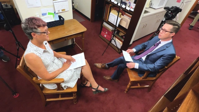 Sen. Sarah Eckhardt sits in her Capitol office for an interview with KXAN's Josh Hinkle about the waitlist.