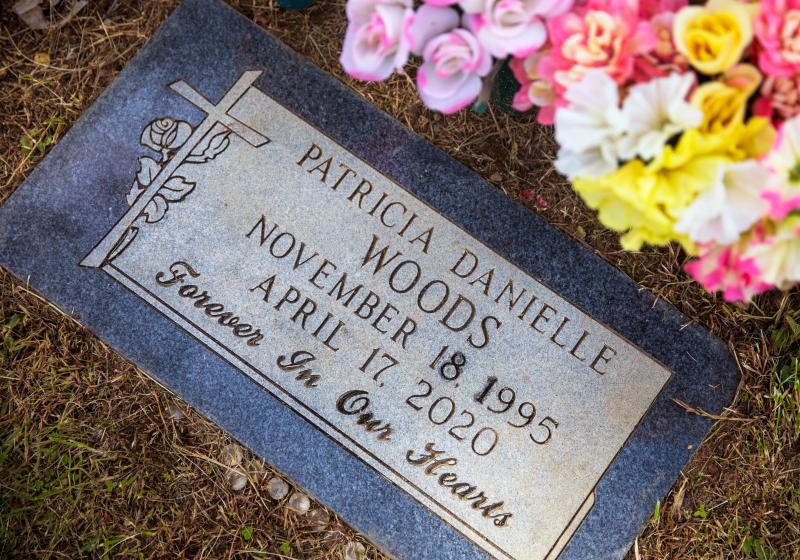 The marker for Patricia Woods, 24, at Cincinnati's Vine Street Hill Cemetery Sept. 30, 2021. She was killed April 17, 2020, in her Westwood apartment while her children, Kayden, then 5, and Kay-Lia, then 14 months, slept. Kayden fled to neighbors for help. Marcus Reed, who Woods was dating, is charged with aggravated murder. LIZ DUFOUR/THE ENQUIRER